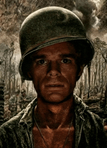 a man wearing a helmet and a necklace looks at the camera