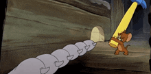 a cartoon of jerry holding a large hammer