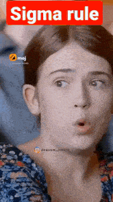 a girl with a surprised look on her face and the words sigma rule on the bottom right
