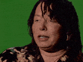 a woman says ketamine is a helluva on a green screen