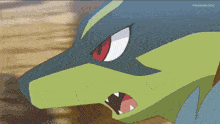 a close up of a cartoon character 's face with its mouth open