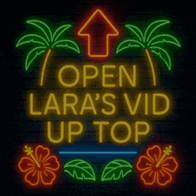 neon sign that says open lara 's vid up top with palm trees and flowers