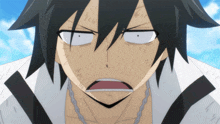 a close up of a person 's face with a surprised look on his face