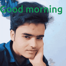 a young man with his hand on his face and the words good morning written above him