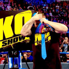 the new day kevin owens big o shirt cant fit putting on a shirt