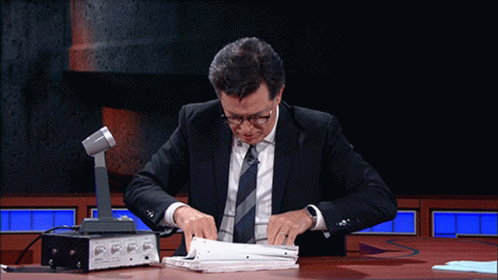 Stephen Colbert Reading GIF - Stephen Colbert Reading Long List GIFs