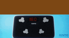 a renpho scale displays the weight of 118.0