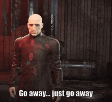 a bald man in a red and black suit is pointing and says " go away just go away "