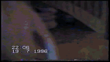 a video from 1996 shows a person walking in a room