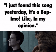 a man is standing next to a statue and says " i just found this song yesterday