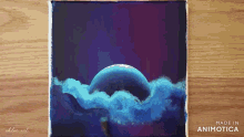 a painting of a moon is being made in animatica