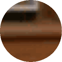 a circle with a blurred image of a person in the background