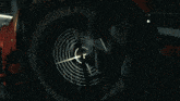 a close up of a circular object with a cross in the middle