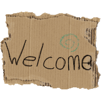 a piece of cardboard that says welcome on it