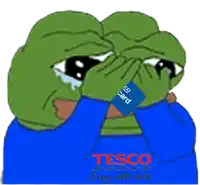 a cartoon frog is crying with a tesco logo in the background