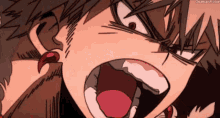 a close up of a person 's face with their mouth open and tongue sticking out .