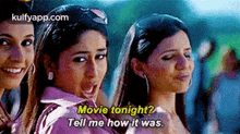 a group of women are standing next to each other and one of them is asking another woman to tell her how it was .