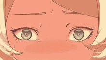 a close up of a person 's eyes with neon lights shining on them .