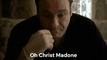 a close up of a man 's face with the words oh christ madone above him