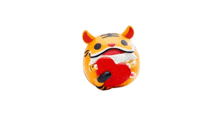 a figurine of a tiger holding a red heart in its mouth