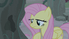 a cartoon pony with a sad look on its face
