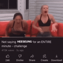 two women are sitting on a red couch with their arms in the air and the caption says not saying heeseung
