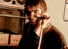 Liam Gallagher Oasis GIF - Liam Gallagher Oasis Smile GIFs