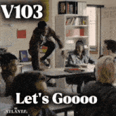 a group of people sitting around a table with the words let 's goooo
