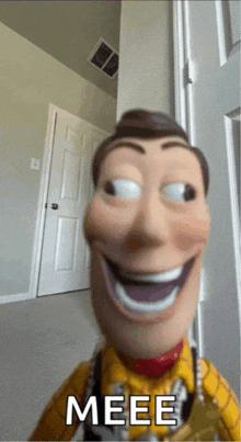 a woody doll is smiling and says meee on the bottom right