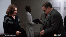 Heres A Present For You Daniel Charles GIF - Heres A Present For You Daniel Charles Dr Richardson GIFs