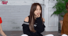 a girl is sitting on the floor with her eyes closed and the words why not on the bottom