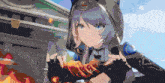 a girl with a hood on is holding something in her hands