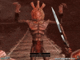 a screenshot of a video game shows a monster with a snake on his head