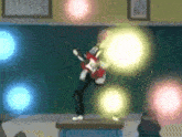 a person playing a guitar in a classroom with a green board behind them