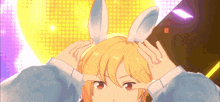 a girl wearing bunny ears is making a peace sign