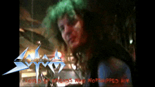 a picture of a man with green hair and the words " loved by friends was worshipped him "