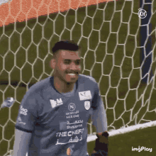 a soccer goalie wearing a jersey that says the chef