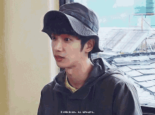 a man wearing a hat with the words delicious as always on it