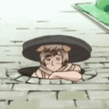 a cartoon character is sticking his head out of a hole in a brick wall .