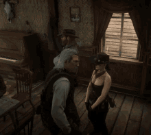 a woman in a cowboy hat is standing next to a man