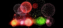 a bunch of colorful fireworks are displayed in the night sky