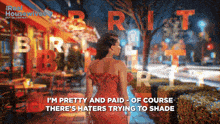 a blurred image of a woman in a red dress with the words i 'm pretty and paid of course
