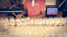 Super Mario Bros Theme Song On Wine Glasses And A Frying Pan GIF - Wine Glass Music GIFs