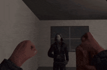 a man in a mask stands in a dark room