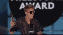 Justin Bieber At Billboard Awards 2013 Gets Booed Winning Milestone Award GIF - Justin Beiber Boo Billboard Awards GIFs