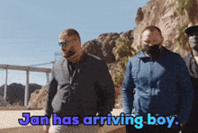 a group of men standing next to each other with the words jan has arriving boy above them