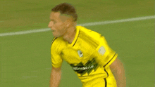 a soccer player with the number 2 on his jersey