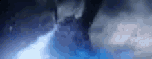 a tornado is moving through the sky at night .