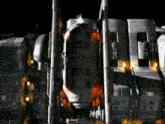 a rocket is being launched into space with a red light on the side of it