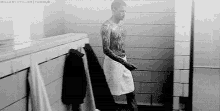 shower guy with tattoos